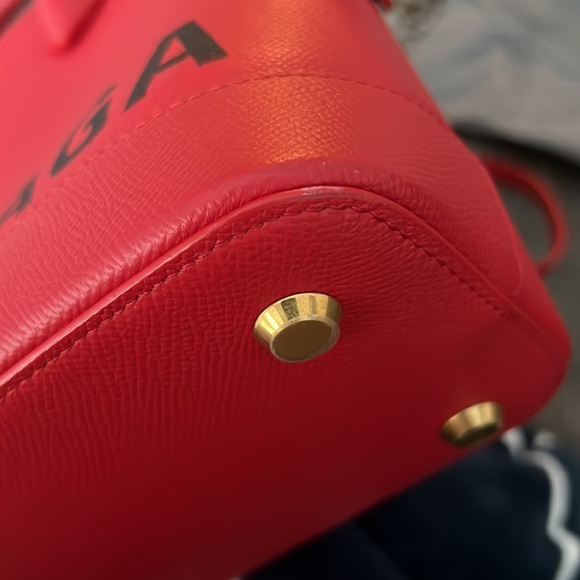 Balenciaga
Ville Top Handle Leather Bag
No Size
Brick Red